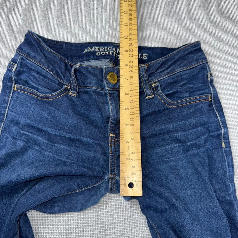 American Eagle Super Stretch Jeggings Dark Wash Distressed Ripped Knee Size 0